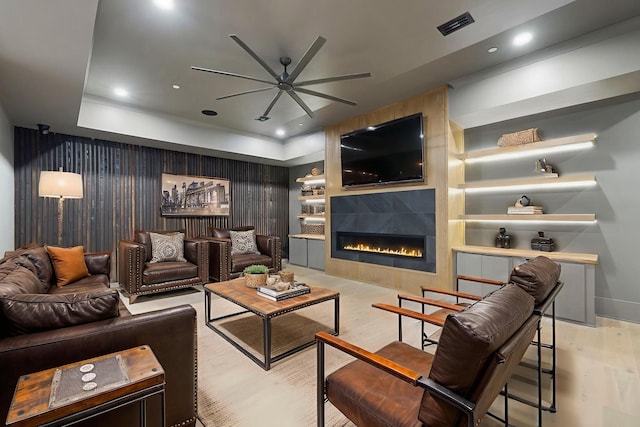 1884 Barnstaple Ln, Brentwood, TN 37027 - living room with light wood-style floors, ceiling fan, a tile fireplace, recessed lighting, and built in features
