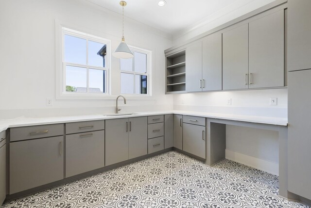 1884 Barnstaple Ln, Brentwood, TN 37027 - kitchen with gray cabinetry, open shelves, decorative light fixtures, light countertops, and light flooring