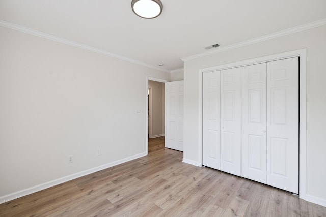 370 Calumet Trce, Murfreesboro, TN 37127 - unfurnished bedroom featuring light wood-style flooring, crown molding, and a closet