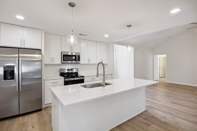 370 Calumet Trce, Murfreesboro, TN 37127 - kitchen with stainless steel appliances, white cabinets, light wood-style floors, light countertops, and decorative light fixtures