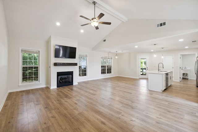 370 Calumet Trce, Murfreesboro, TN 37127 - unfurnished living room featuring beamed ceiling, a ceiling fan, light wood finished floors, a fireplace, and high vaulted ceiling