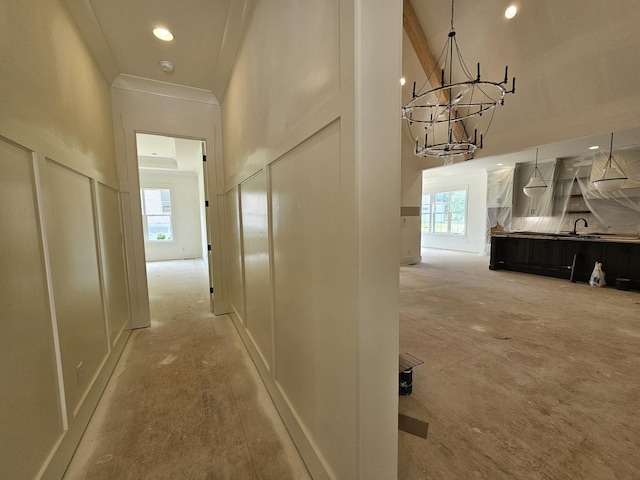 3244 Arundel Ln, Thompsons Station, TN 37179 - corridor featuring a towering ceiling, a chandelier, and recessed lighting