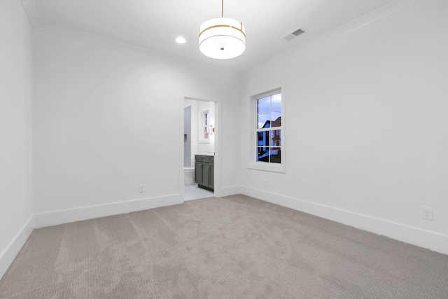 3244 Arundel Ln, Thompsons Station, TN 37179 - spare room featuring crown molding and light carpet