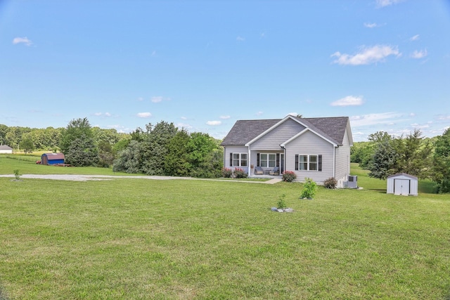 1219 Oak Grove Rd, Dickson, TN 37055 - view of front facade with a storage shed and a front lawn
