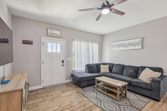 1219 Oak Grove Rd, Dickson, TN 37055 - living area with ceiling fan and light wood-style flooring