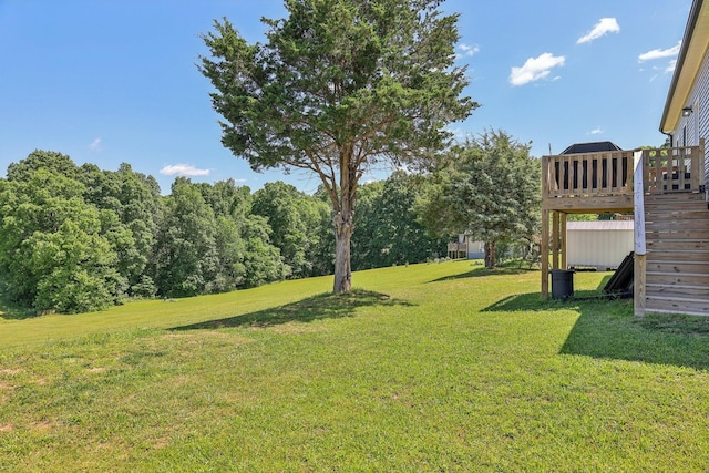 1219 Oak Grove Rd, Dickson, TN 37055 - view of green lawn with stairs and a deck