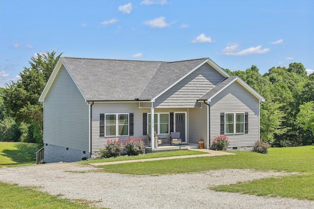 1219 Oak Grove Rd, Dickson, TN 37055 - view of front of home with crawl space, a front yard, roof with shingles, and a patio