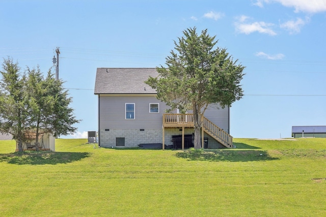 1219 Oak Grove Rd, Dickson, TN 37055 - rear view of house with stairway, a wooden deck, and a yard