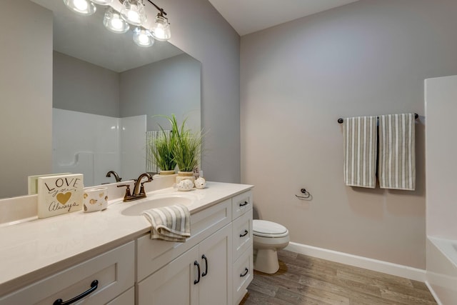 1219 Oak Grove Rd, Dickson, TN 37055 - full bathroom with vanity and wood finished floors
