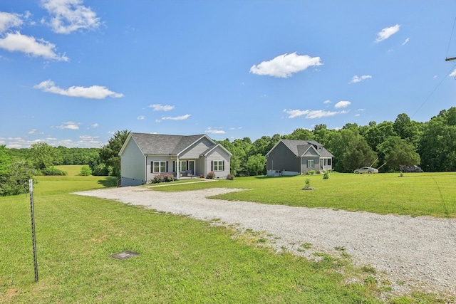 1219 Oak Grove Rd, Dickson, TN 37055 - single story home featuring driveway and a front lawn