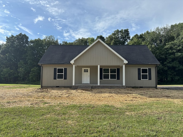 760 Hanestown Rd, Lafayette, TN 37083 - view of front of house featuring a porch, a front lawn, a shingled roof, and crawl space