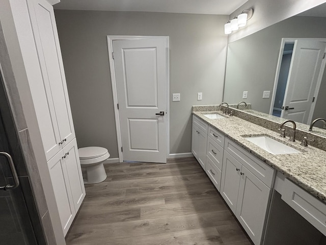 760 Hanestown Rd, Lafayette, TN 37083 - full bathroom with double vanity and wood finished floors