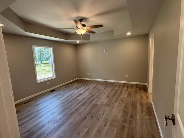 760 Hanestown Rd, Lafayette, TN 37083 - unfurnished room featuring a tray ceiling, ceiling fan, wood finished floors, and recessed lighting