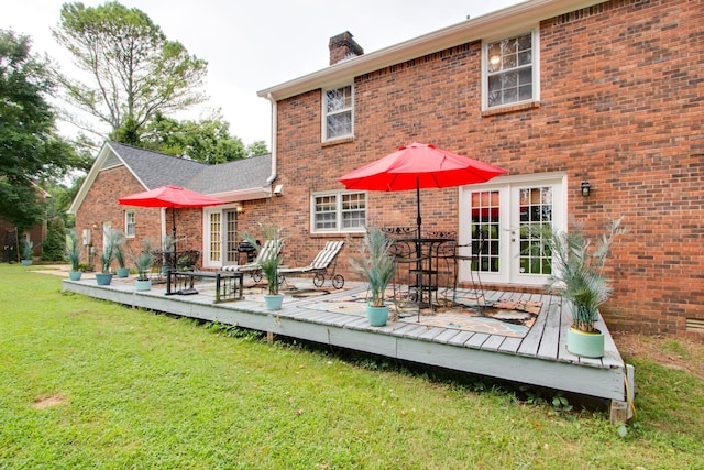 201 Stoneybrook Rd, Columbia, TN 38401 - rear view of house with french doors, a wooden deck, a chimney, and a lawn