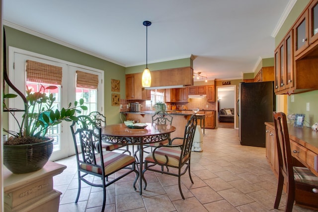 201 Stoneybrook Rd, Columbia, TN 38401 - dining area featuring crown molding and light stone finish floors