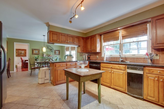 201 Stoneybrook Rd, Columbia, TN 38401 - kitchen featuring a peninsula, ornamental molding, backsplash, and brown cabinets