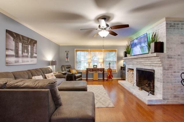 201 Stoneybrook Rd, Columbia, TN 38401 - living room featuring ceiling fan, crown molding, light wood-style floors, and a fireplace