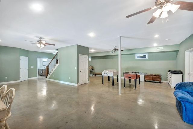 3534 Summertown Hwy, Summertown, TN 38483 - living area with ceiling fan, finished concrete floors, stairway, and recessed lighting
