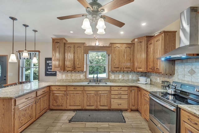 3534 Summertown Hwy, Summertown, TN 38483 - kitchen featuring stainless steel electric range oven, wall chimney exhaust hood, ceiling fan, decorative backsplash, and a peninsula