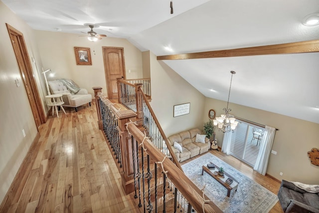 3534 Summertown Hwy, Summertown, TN 38483 - living room featuring vaulted ceiling, light wood-style floors, a ceiling fan, and a chandelier