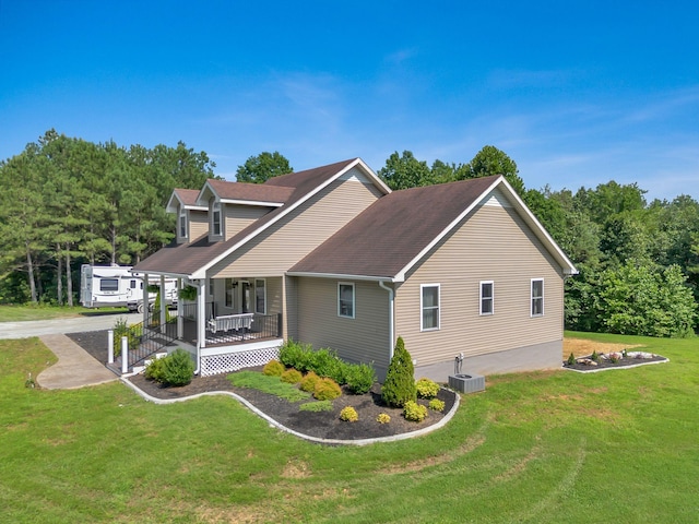 3534 Summertown Hwy, Summertown, TN 38483 - view of property exterior with a porch, a lawn, and a shingled roof
