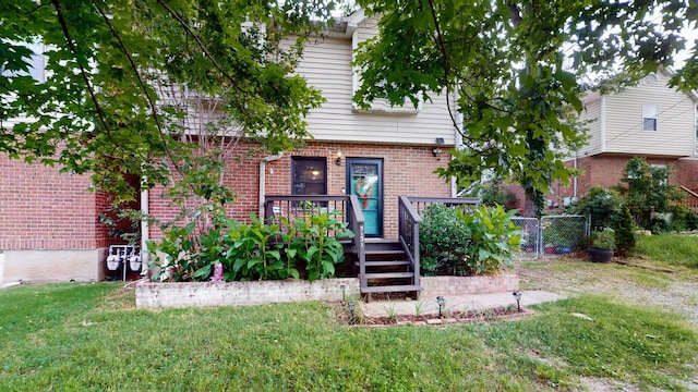 5131 Hunters Point Ln, Hermitage, TN 37076 - view of property featuring brick siding and a deck