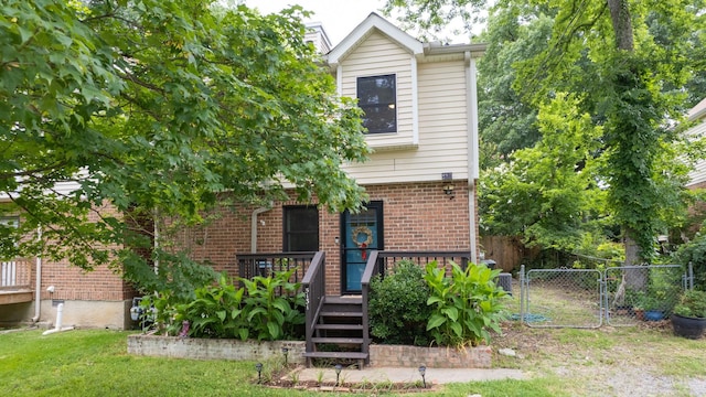 5131 Hunters Point Ln, Hermitage, TN 37076 - view of front facade featuring brick siding and a gate