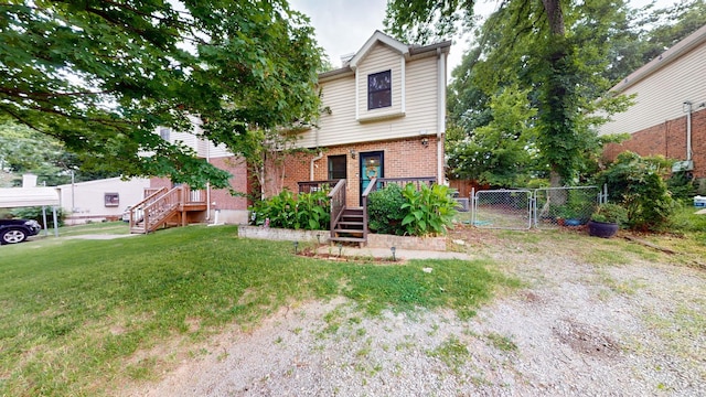 5131 Hunters Point Ln, Hermitage, TN 37076 - view of front facade featuring a gate and brick siding