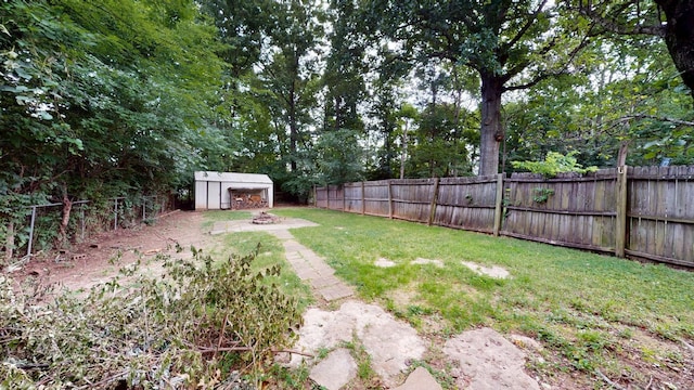 5131 Hunters Point Ln, Hermitage, TN 37076 - fenced backyard featuring a storage shed and an outdoor fire pit