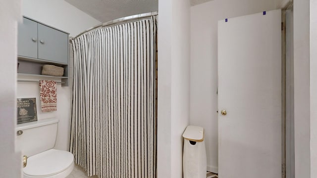 5131 Hunters Point Ln, Hermitage, TN 37076 - bathroom with toilet and a shower with shower curtain