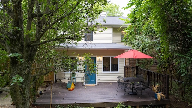 5131 Hunters Point Ln, Hermitage, TN 37076 - back of house with a wooden deck, outdoor dining area, and a chimney