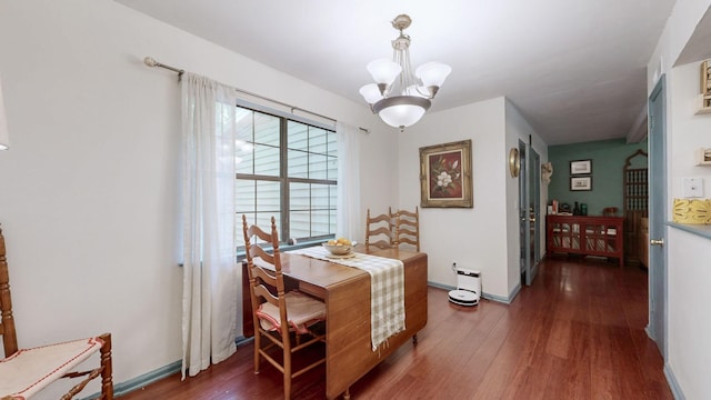 5131 Hunters Point Ln, Hermitage, TN 37076 - dining room with dark wood finished floors and a chandelier