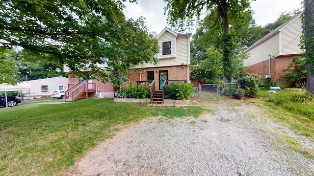 5131 Hunters Point Ln, Hermitage, TN 37076 - view of front of home featuring brick siding and a gate
