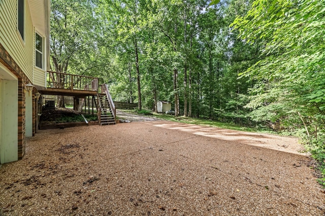 7125 Sutton Pl, Fairview, TN 37062 - view of yard with stairs, a shed, and a deck
