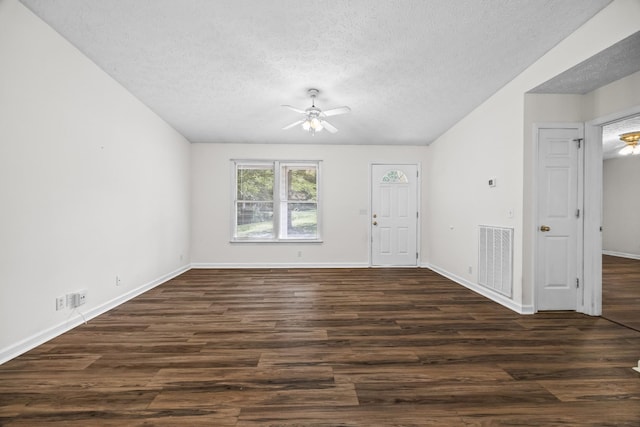 7125 Sutton Pl, Fairview, TN 37062 - empty room with a textured ceiling, ceiling fan, and dark wood-type flooring