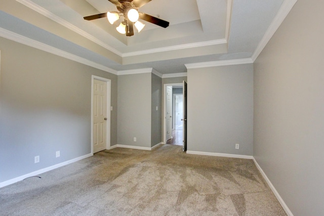 4425 Taylor Hall Ln, Adams, TN 37010 - empty room with a raised ceiling, a ceiling fan, carpet floors, and ornamental molding