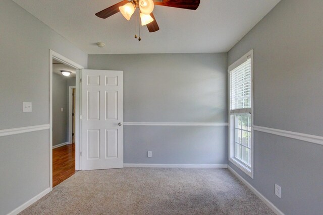 4425 Taylor Hall Ln, Adams, TN 37010 - carpeted spare room with plenty of natural light, a ceiling fan, and a smoke detector