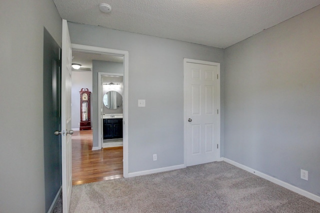 4425 Taylor Hall Ln, Adams, TN 37010 - unfurnished bedroom with carpet floors and a textured ceiling