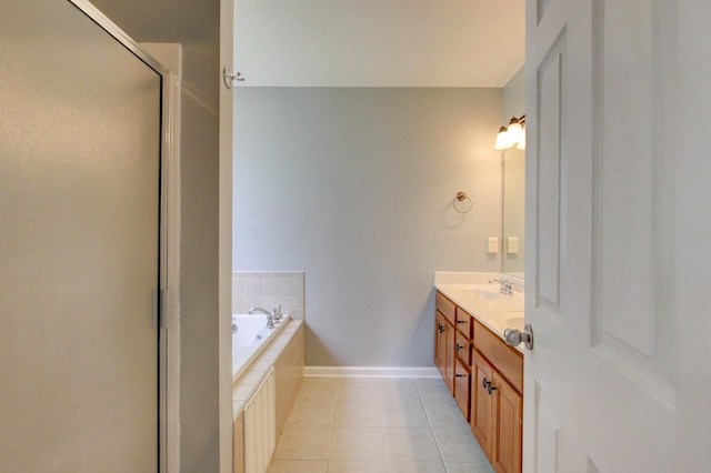 4425 Taylor Hall Ln, Adams, TN 37010 - full bathroom featuring double vanity, a garden tub, tile patterned floors, and a shower stall