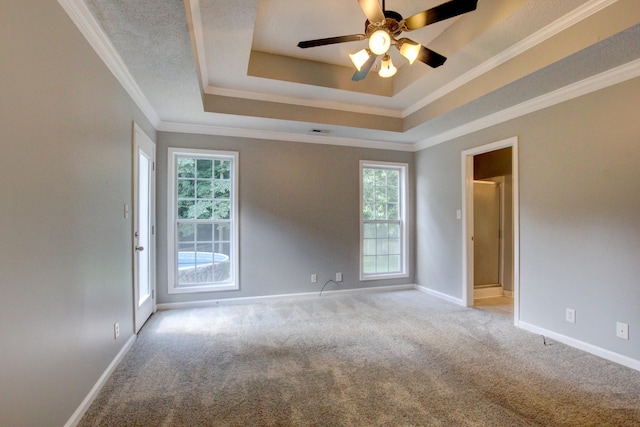 4425 Taylor Hall Ln, Adams, TN 37010 - unfurnished room featuring a tray ceiling, carpet, ornamental molding, and a ceiling fan