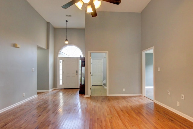 4425 Taylor Hall Ln, Adams, TN 37010 - entryway with a towering ceiling, a ceiling fan, and light wood finished floors