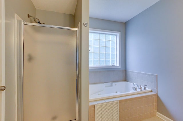 4425 Taylor Hall Ln, Adams, TN 37010 - bathroom featuring a stall shower and a tub with jets