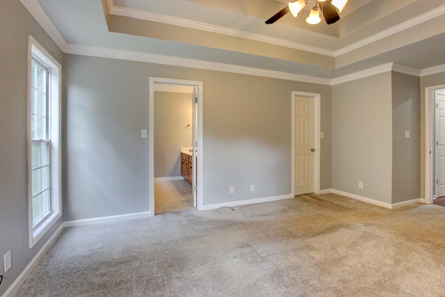 4425 Taylor Hall Ln, Adams, TN 37010 - spare room with a raised ceiling, plenty of natural light, a ceiling fan, light carpet, and crown molding