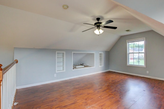 4425 Taylor Hall Ln, Adams, TN 37010 - additional living space featuring built in features, dark wood finished floors, vaulted ceiling, and a ceiling fan