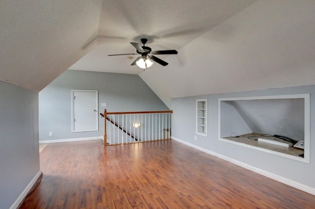 4425 Taylor Hall Ln, Adams, TN 37010 - bonus room with built in shelves, wood finished floors, ceiling fan, and vaulted ceiling