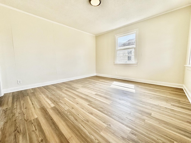 810 Roanoke Ave, Chattanooga, TN 37404 - unfurnished room featuring crown molding, a textured ceiling, and wood finished floors