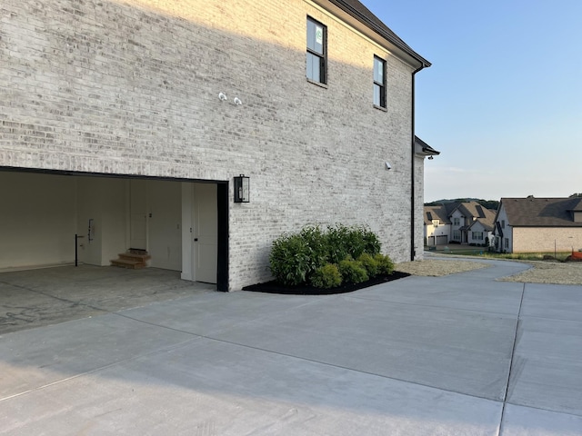 133 Scarsdale Dr S, Hendersonville, TN 37075 - view of property exterior featuring driveway and brick siding