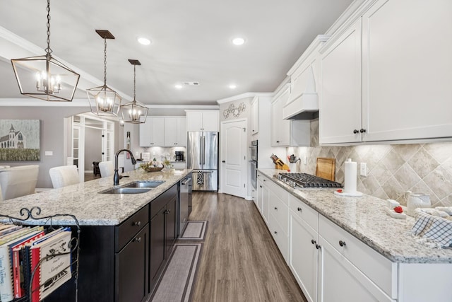 679 Overton Way, Spring Hill, TN 37174 - kitchen with stainless steel appliances, white cabinets, a chandelier, decorative backsplash, and recessed lighting