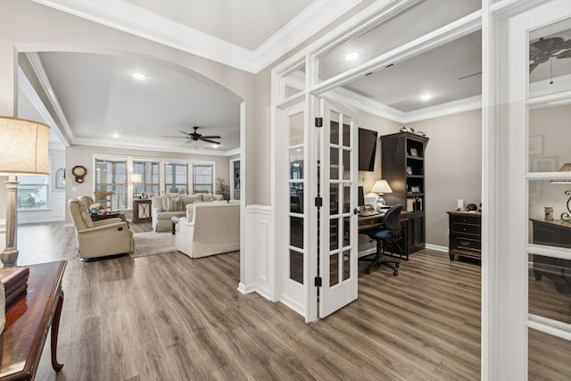 679 Overton Way, Spring Hill, TN 37174 - office area with ceiling fan, healthy amount of natural light, wood finished floors, arched walkways, and crown molding