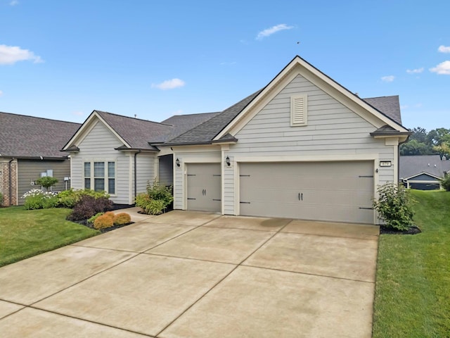 679 Overton Way, Spring Hill, TN 37174 - ranch-style house with an attached garage, driveway, a front lawn, and roof with shingles